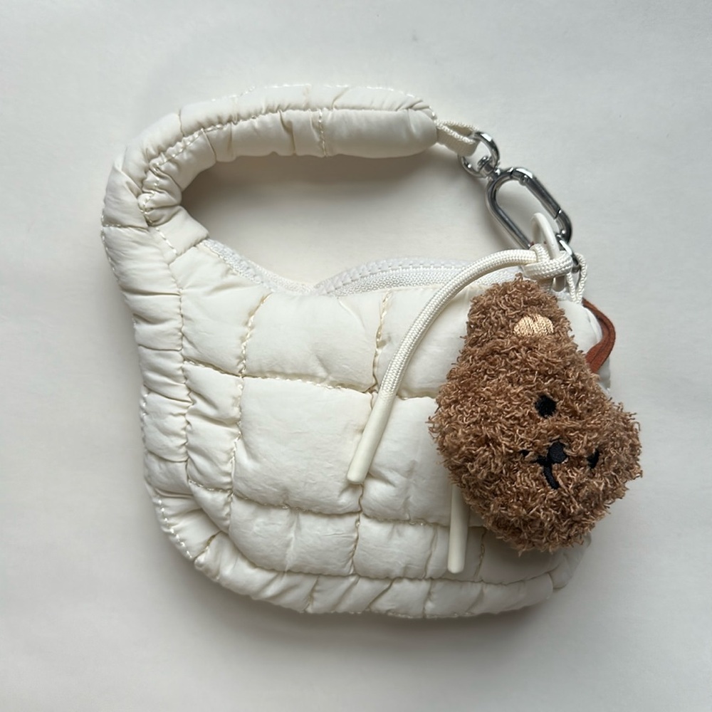 Toy purse with teddy bear charm